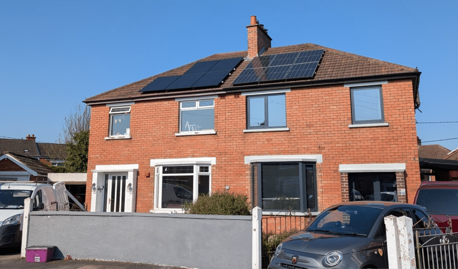 Solar panels on a red brick Belfast home in Northern Ireland