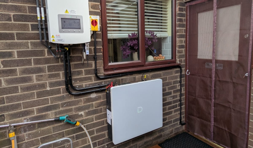 A residential home with a hybrid Solis inverter connected to 10kWh Dyness battery, installed by First Class Solar in Belfast, Northern Ireland.