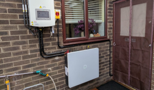 A residential home with a hybrid Solis inverter connected to 10kWh Dyness battery, installed by First Class Solar in Belfast, Northern Ireland.